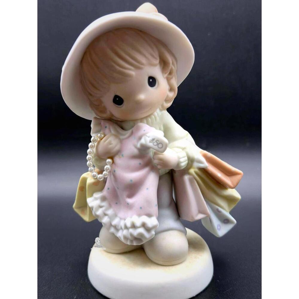 Precious Moments Shopping Girl Figurine with Pink Dress